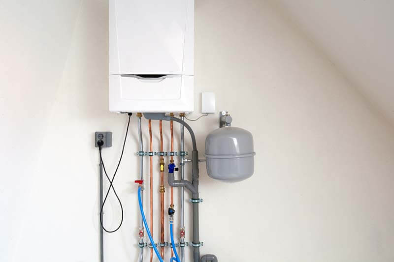 New Gas Boiler, Heating System With Copper Pipes, Valves And Other Equipment In A Boiler Room Gas Heater System, Modern In New House