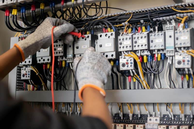 Electrician Engineer Uses A Multimeter To Test The Electrical In